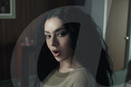 Charlie XCX and Billi Eilish climb lingerie mountain