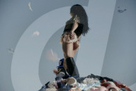 Charlie XCX and Billi Eilish climb lingerie mountain