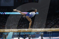Simone Biles slips off balance beam during finals