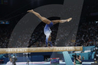 Simone Biles slips off balance beam during finals