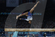 Simone Biles slips off balance beam during finals