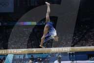 Simone Biles slips off balance beam during finals