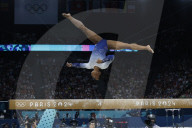 Simone Biles slips off balance beam during finals