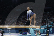 Simone Biles slips off balance beam during finals