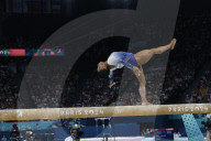 Simone Biles slips off balance beam during finals