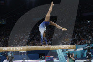 Simone Biles slips off balance beam during finals