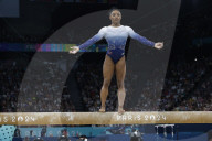 Simone Biles slips off balance beam during finals