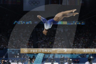 Simone Biles slips off balance beam during finals