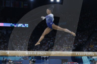 Simone Biles slips off balance beam during finals