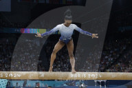 Simone Biles slips off balance beam during finals