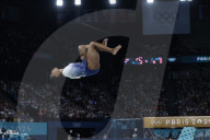 Simone Biles slips off balance beam during finals