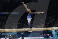 Simone Biles slips off balance beam during finals