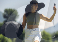 Sun hat with solar panels to power gadgets in the go