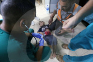 Injured Gazans arrive hospital after Israeli attack