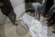 Injured Gazans arrive hospital after Israeli attack