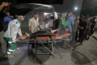 Injured Gazans arrive hospital after Israeli attack