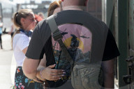 Famlies say their goodbyes as Ukraine soldiers head for frontlines