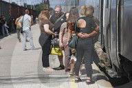 Famlies say their goodbyes as Ukraine soldiers head for frontlines