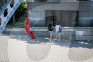 Sculpture of girl on swing by James Colomina in Kyiv