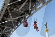 Sculpture of girl on swing by James Colomina in Kyiv
