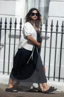 Excl - Pregnant Jenna Coleman shows off her blossoming baby bump as she enjoys a stroll in north London with her Mum