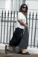 Excl - Pregnant Jenna Coleman shows off her blossoming baby bump as she enjoys a stroll in north London with her Mum