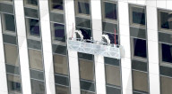 Skyscraper window cleaning robots