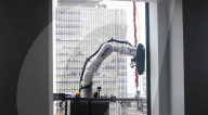 Skyscraper window cleaning robots