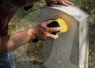 Volunteers beautify veterans' headstones in remembrance of 9/11