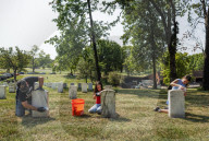 Volunteers beautify veterans' headstones in remembrance of 9/11