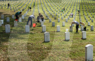 Volunteers beautify veterans' headstones in remembrance of 9/11