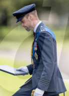 A gaunt looking Prince William sports a beard at Sovereign's Parade