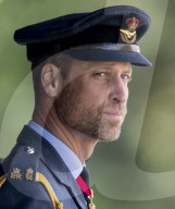 A gaunt looking Prince William sports a beard at Sovereign's Parade