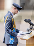A gaunt looking Prince William sports a beard at Sovereign's Parade