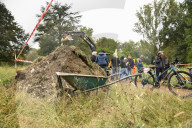 Manifestanti dei comitati ambientalisti ostruiscono il passaggio ad una ruspa presso il Parco del Meisino contro la costruzione della Cittadella Dello Sport di Torino