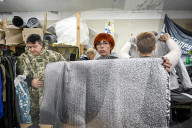 Zaporizhzhia volunteers make anti-thermal imaging ponchos for military
