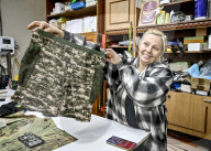 Zaporizhzhia volunteers make anti-thermal imaging ponchos for military