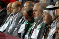 Hamas militants holds memorial for Palestinians