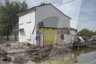'It's shameful and I won't pay it': flood-hit Italians rage against insurance call