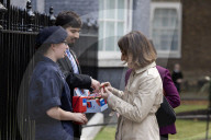 Prime Minister Keir Starmer buys poppy on the steps of No10