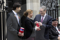 Prime Minister Keir Starmer buys poppy on the steps of No10