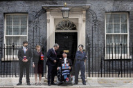 Prime Minister Keir Starmer buys poppy on the steps of No10