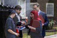 Prime Minister Keir Starmer buys poppy on the steps of No10