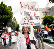 Hollywood, California, USA. 19th Mar, 2011. SUZANNE VERDAL, who was the inspiration for the Leonard Cohen song 'Suzanne' is among thousands who participate in an anti-war rally organized by a coalition of progressive groups from the greater Los Angeles ar