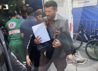 Wounded Palestinians arrive hospital