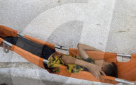 Wounded Palestinians arrive hospital