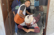 Wounded Palestinians arrive hospital