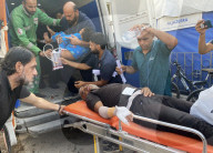 Wounded Palestinians arrive hospital