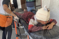 Wounded Palestinians arrive hospital
