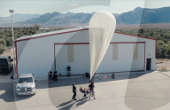 Suitcase dropped from space lands without a scratch